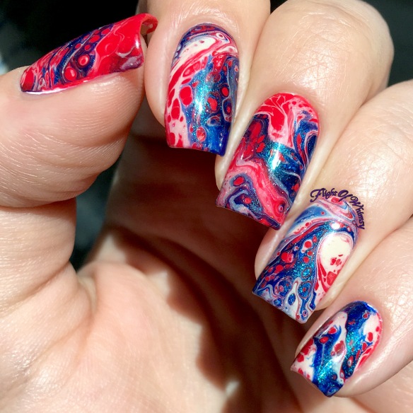 red and blue marble nail design